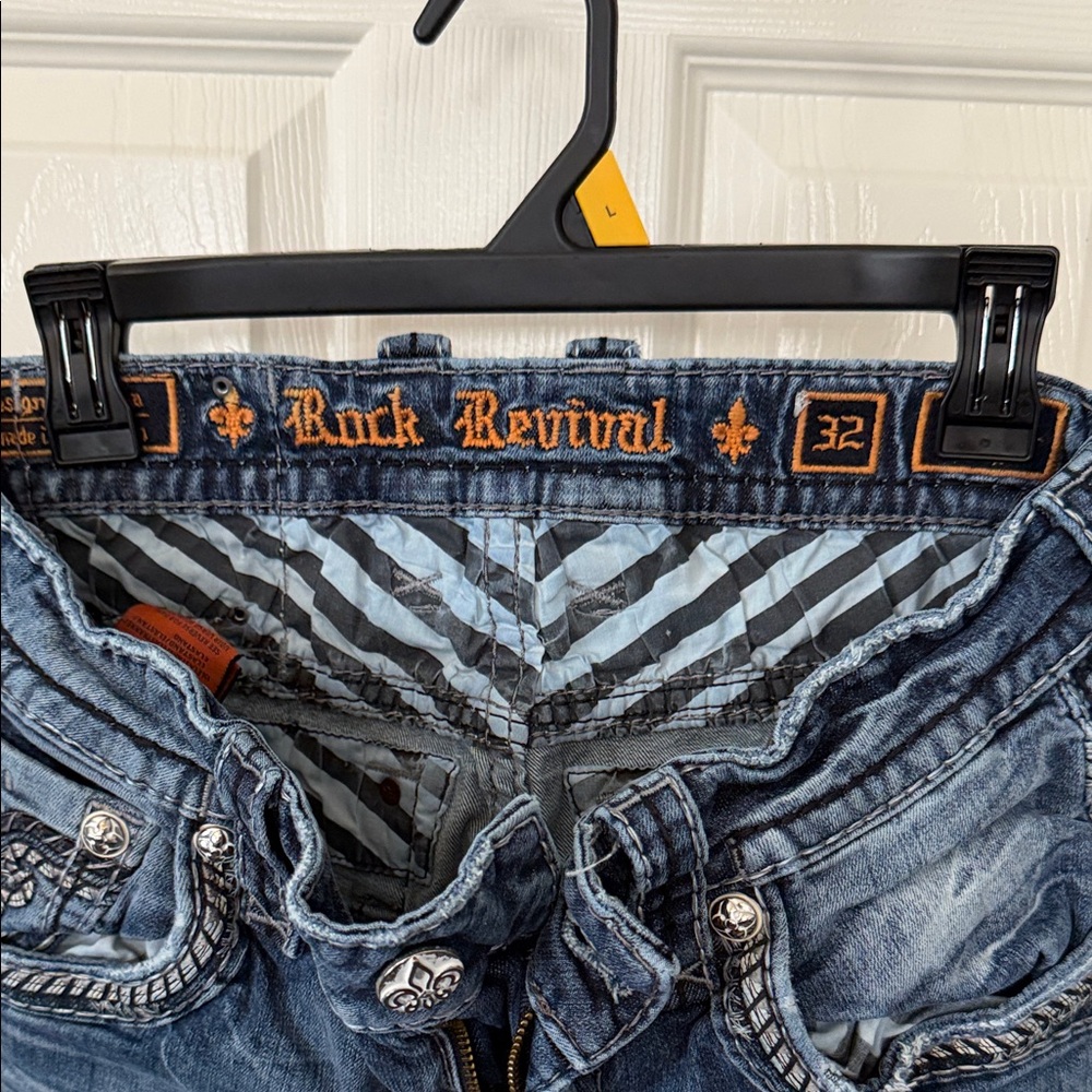 Rock Revival Blue Denim Jeans with Orange Embroidered Logo